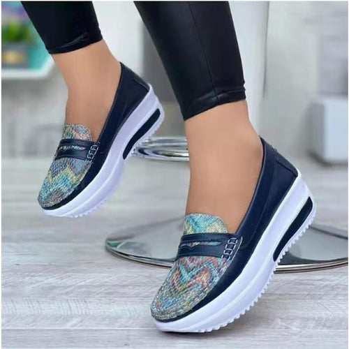 Women's comfortable Slip-On shoes with a stylish snake leather design and a cushioned sole Lune London