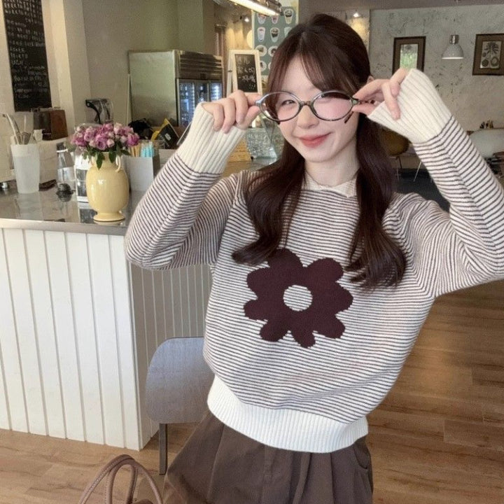 Women's striped sweater with floral appliqué and casual cut
