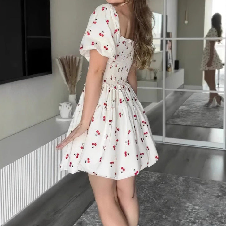 Summer dress for women with puff sleeves and a floral design Lune London