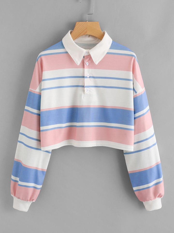 Women's polo shirt in a casual crop design with a stylish color block pattern Chic & Stil