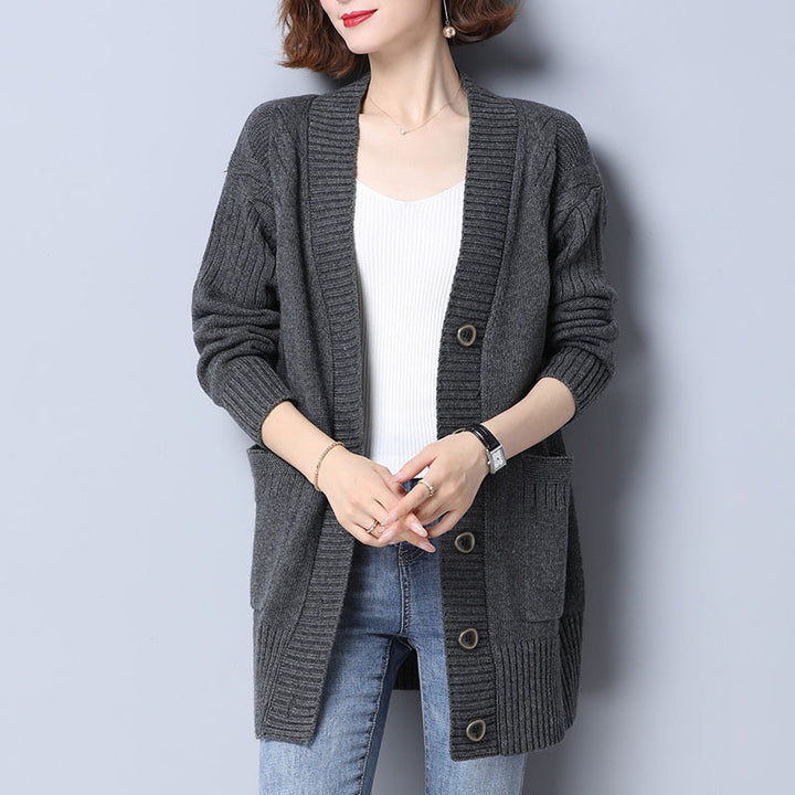 Ladies comfortable knitted cardigan with deep ribbed pattern and practical pockets Lune London