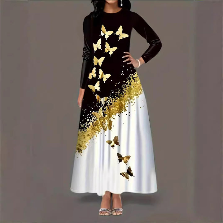 Maxi dress for women with an elegant butterfly pattern and a sparkling gold accent Lune London