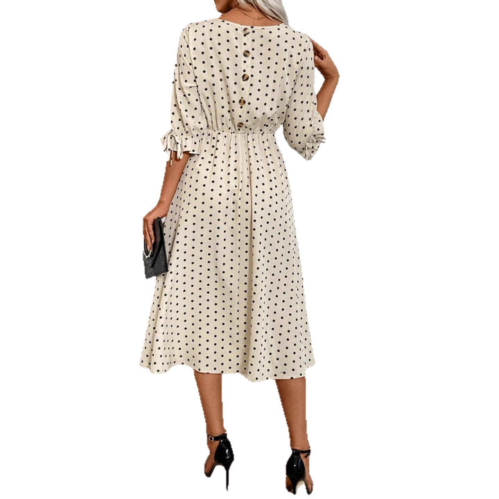 Lune London puff sleeve midi dress with an elastic waist