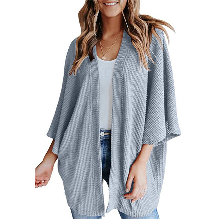 Ladies casual knit kimono with a loose fit and chic casual design