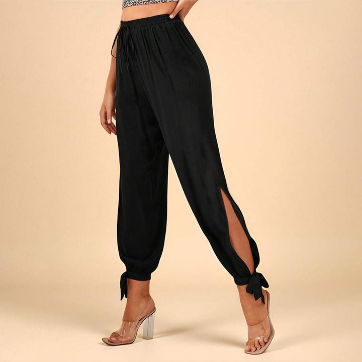 Pantalons élégants pour femmes avec fentes latérales et cordon de serrage Chic & Stil