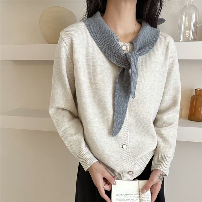 Fashionable women's cardigan with decorative scarf and button details Lune London