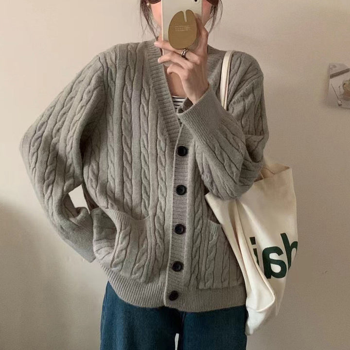 Ladies chunky knit vest with clover pattern and practical pockets Lune London