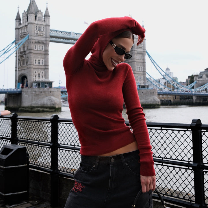 Women's fitted long sleeve top with high collar and thumb openings Lune London