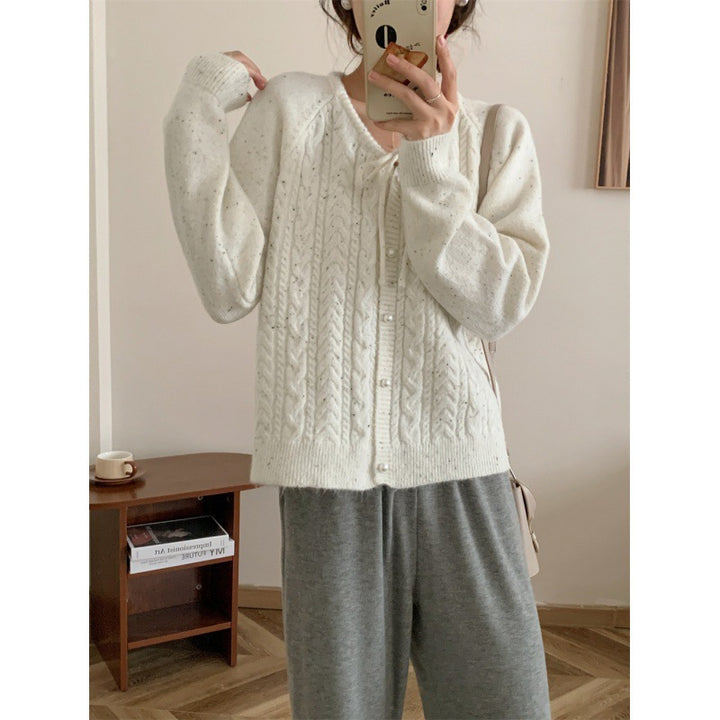 Chunky knit jacket for women with elegant pearl buttons and a structured design Lune London