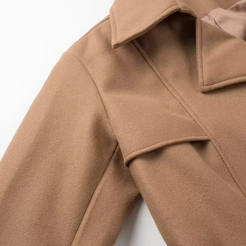 Elegant trench coat for women with shoulder pads and waist belt Lune London