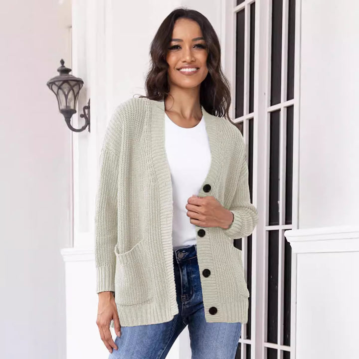 Ladies chunky knit cardigan with large pockets and modern button design Chic and Still