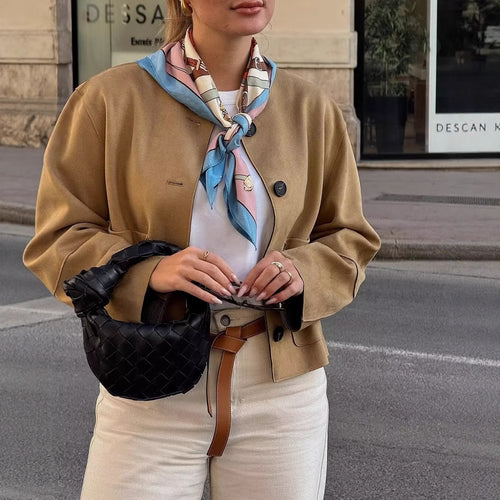 Short jacket with short sleeves for women, featuring practical pockets and elegant buttons Lune London