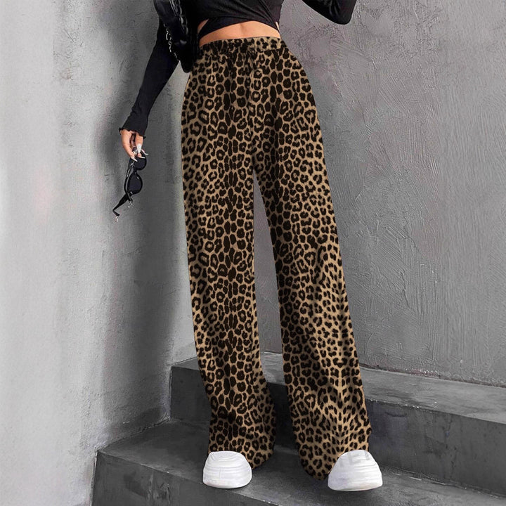 Pantalons plissés à coupe large pour femmes avec taille élastique et poches latérales pratiques Chic & Stil
