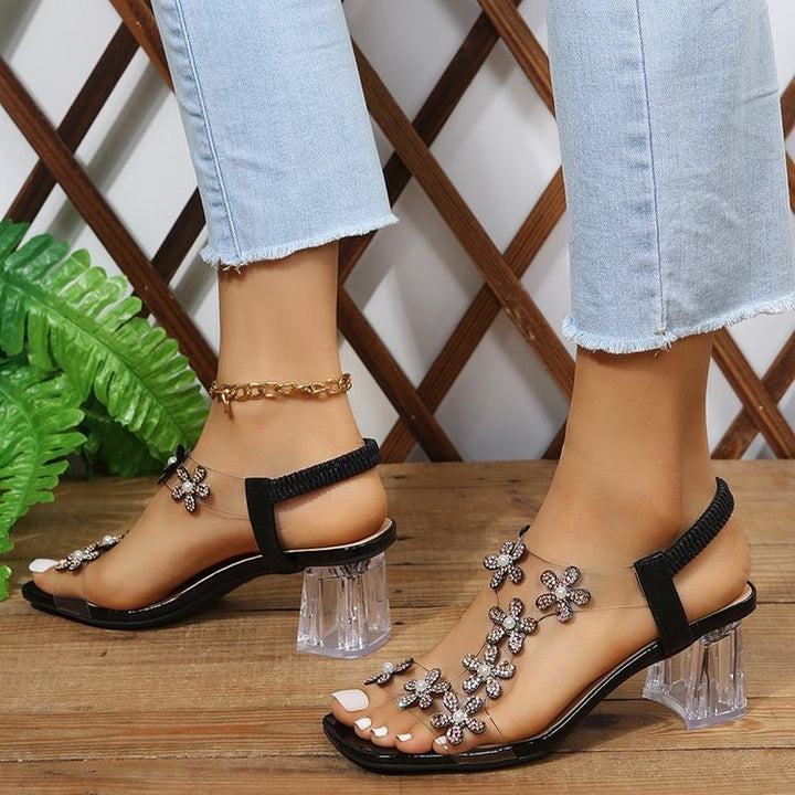 Elegant ladies sandals with floral appliqués and transparent heel Lune London