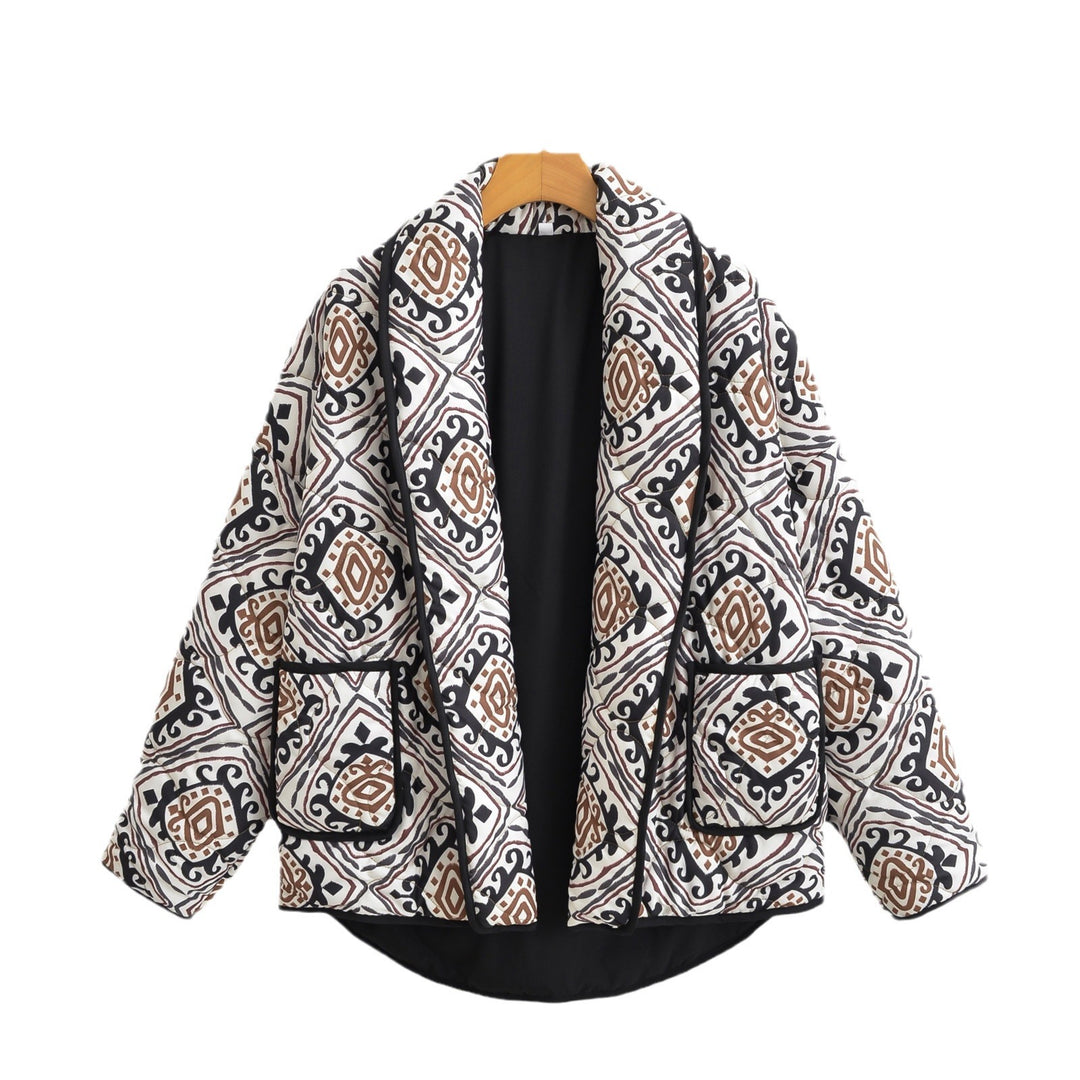 Veste matelassée élégante pour femmes avec ceinture à la taille et manches larges Chic & Stil
