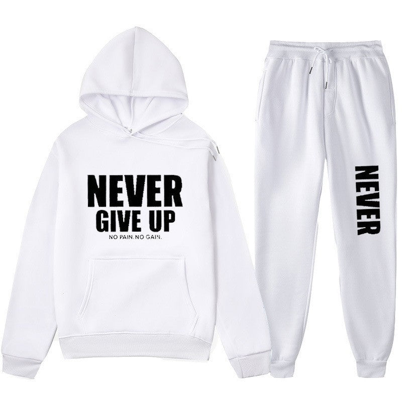 Women's training pullover and jogging pants in motif set with motivating print Chic & Stil