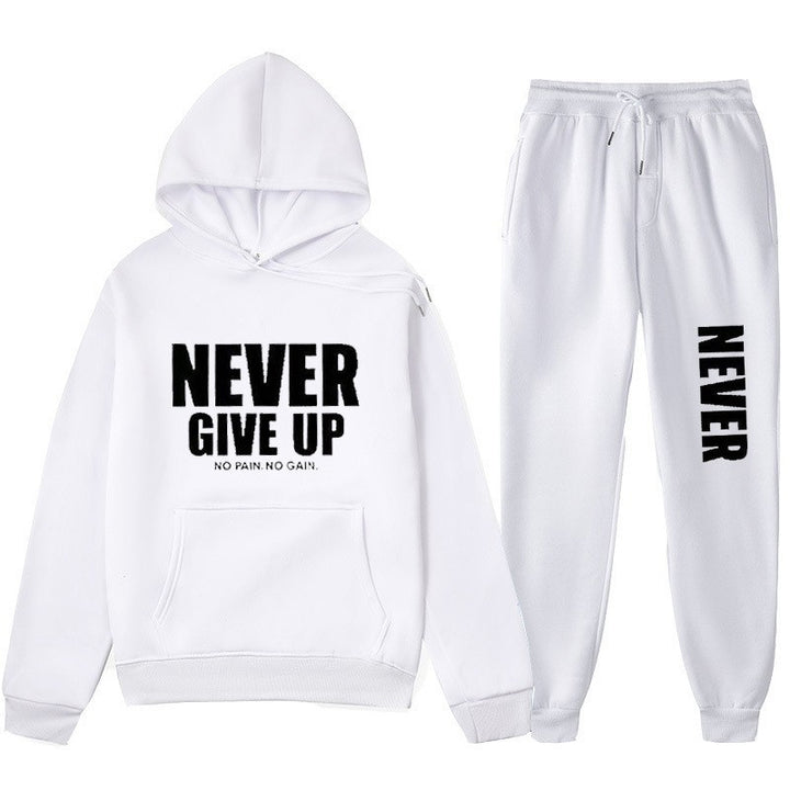 Women's training pullover and jogging pants in motif set with motivating print Chic & Stil