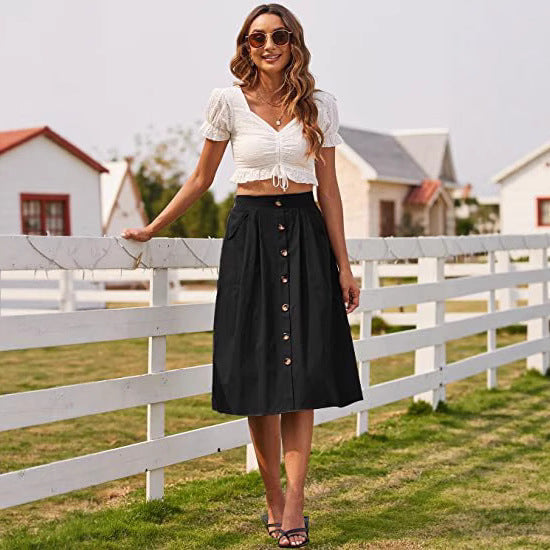 Midi skirt for women with button placket and practical pockets Lune London