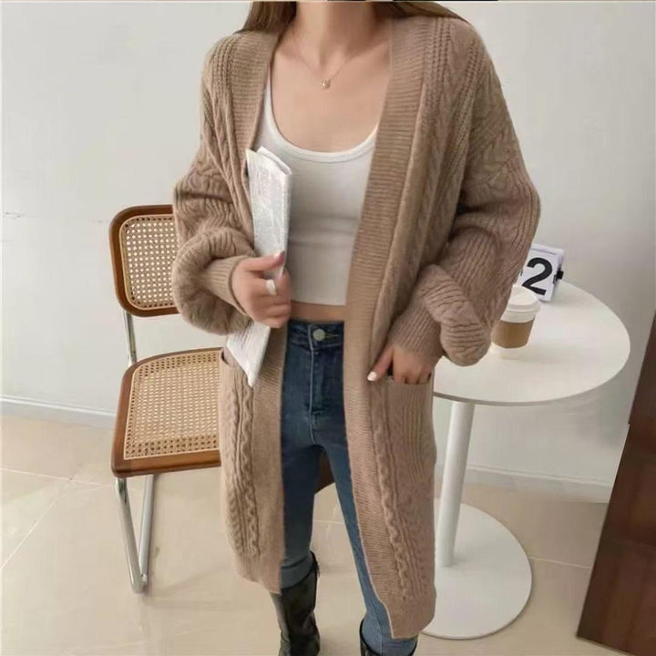 Ladies Thick Knit Cardigan with deep pockets and elegant Braid design Lune London