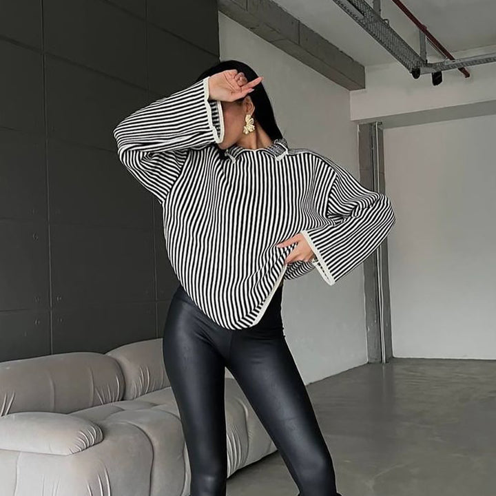 Knitted sweater for ladies with a relaxed high collar and chic elegant stripes