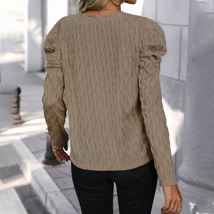 Pull pour femmes avec motif de vagues texturé et élégantes manches bouffantes Chic & Stil