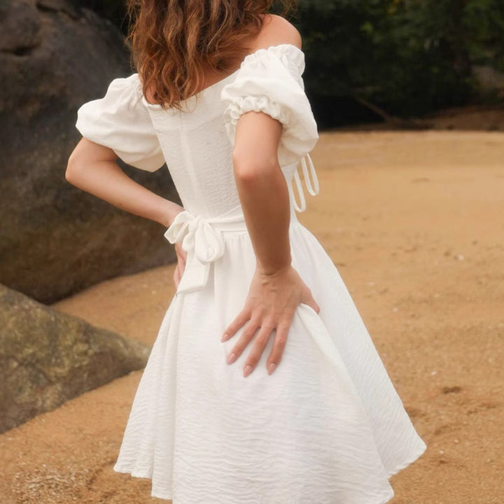 Off-shoulder mini dress for women with ruffled sleeves and bow at the waist Lune London