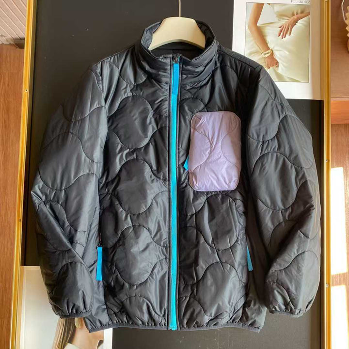Veste matelassée légère pour femmes avec col haut et poches pratiques Chic & Stil