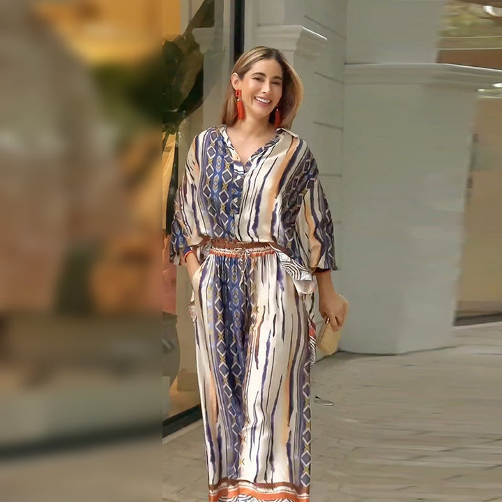 Elegant maxi dress for women with a modern graphic pattern and a fitted bust area Lune London