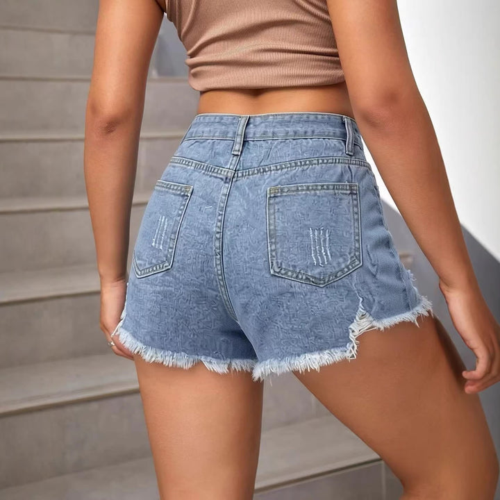 Women's fashionable destroyed denim shorts with frayed hem Lune London