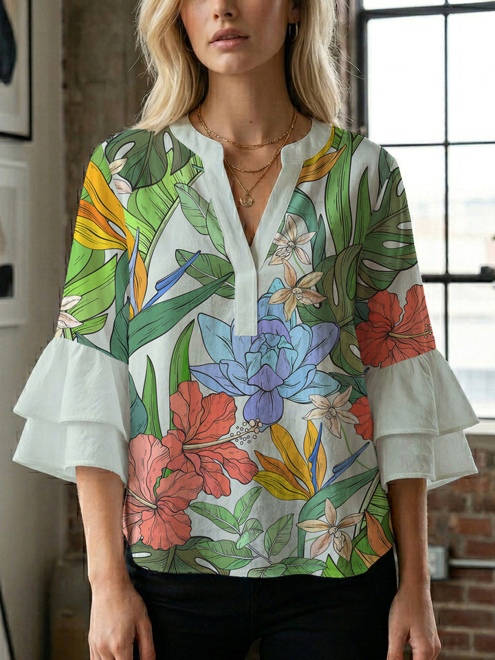 Ladies elegant blouse shirt with voluminous puff sleeves and graphic floral design Lune London