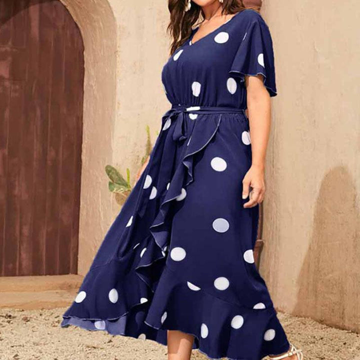 Maxi dress for women with a playful polka dot pattern and a fitted belt Lune London