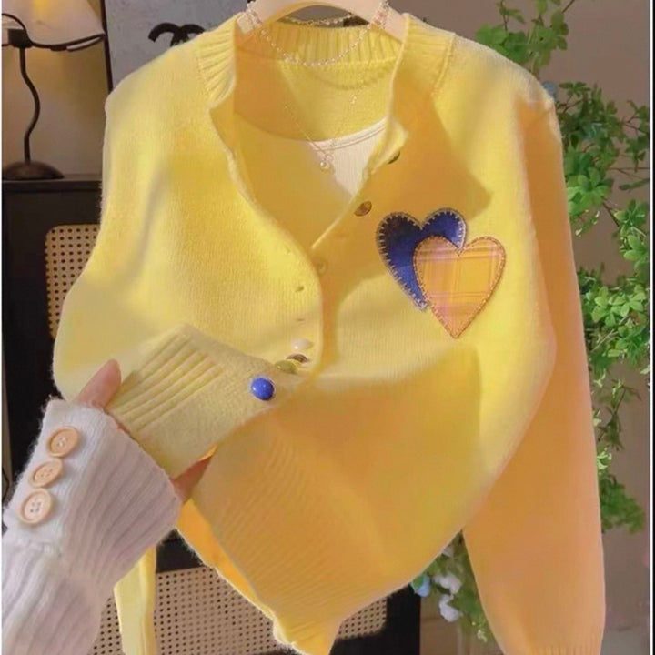Cardigan for women with heart-shaped appliqués and colorful button details Lune London