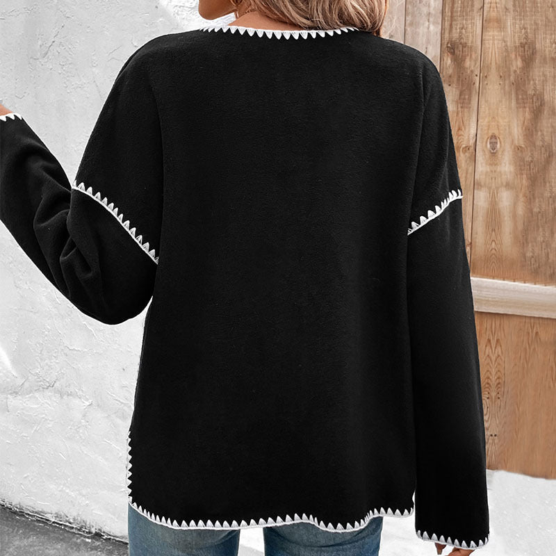 Fashionable knitted jacket for women with contrasting seams Lune London