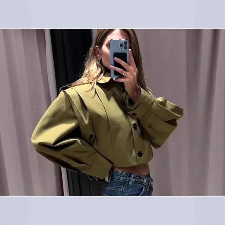 Fitted feminine blouse with continuous button details Lune London