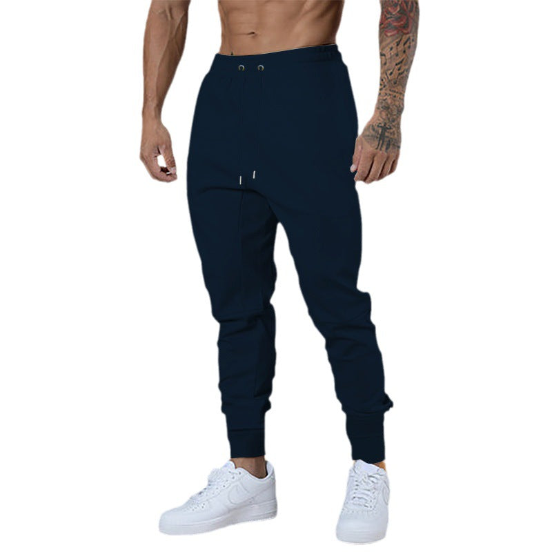 Men's sporty jogger pants with elastic waistband and practical zip pockets Lune London