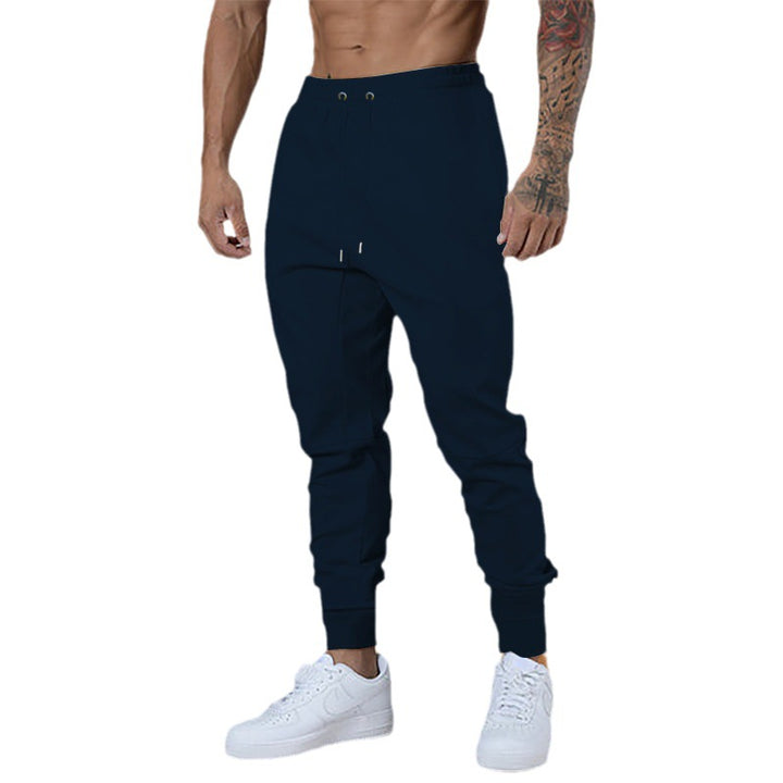 Men's sporty jogger pants with elastic waistband and practical zip pockets Lune London
