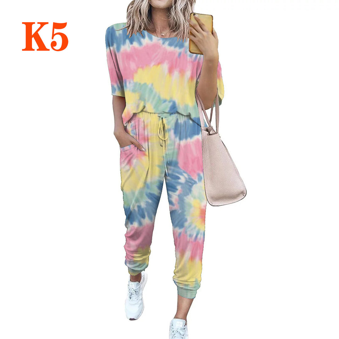 Ladies lightweight casual jumpsuit with a striking tie-dye pattern and practical pockets Lune London