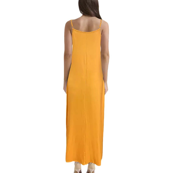 Maxi dress for women with modern ethnic print and practical side pockets Lune London