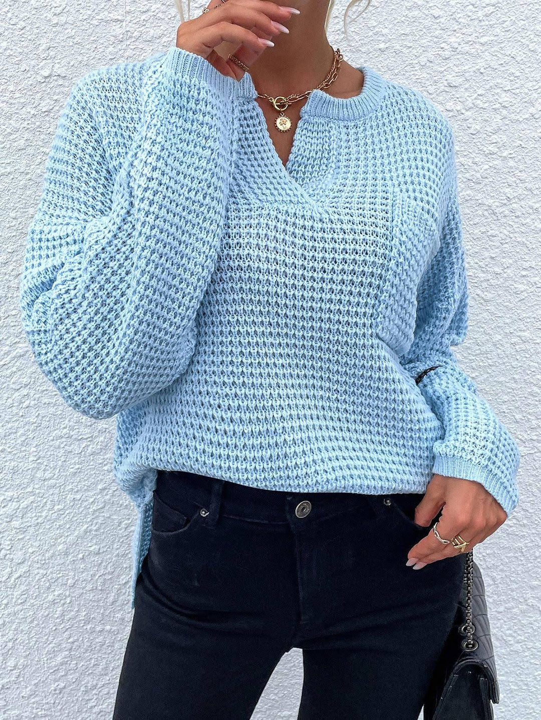 Casual knit sweater for women with V-neck and textured surface Lune London