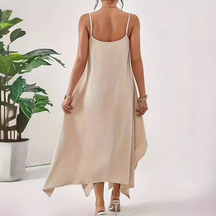 Light women's dress with spaghetti straps, asymmetrical hem, and soft fabric Lune London