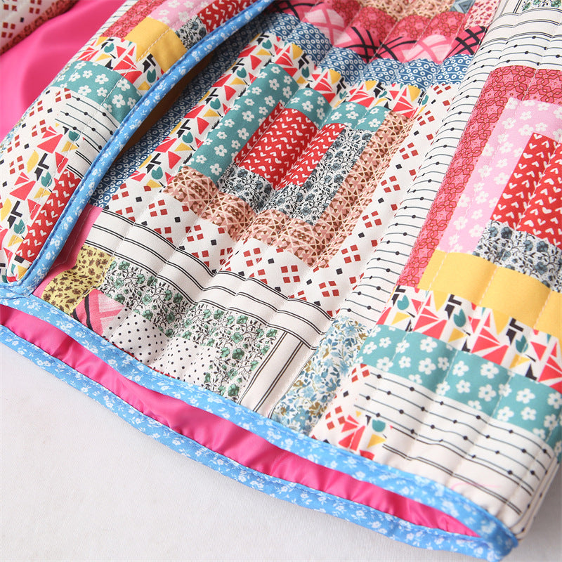 Quilted patchwork jacket for women with a colorful design and practical pockets Lune London