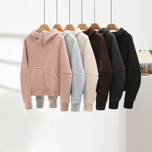 Veste à capuche confortable pour femme avec col montant et poches pratiques Chic & Stil