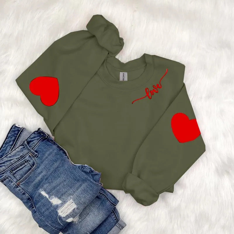 Sweatshirt femme avec design cœur et coupe décontractée Chic & Stil