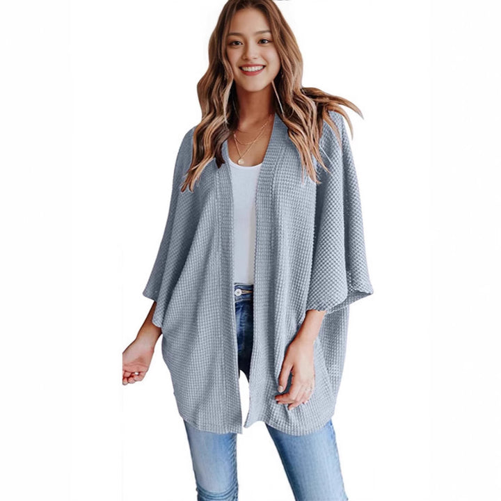 Ladies casual knit kimono with a loose fit and chic casual design