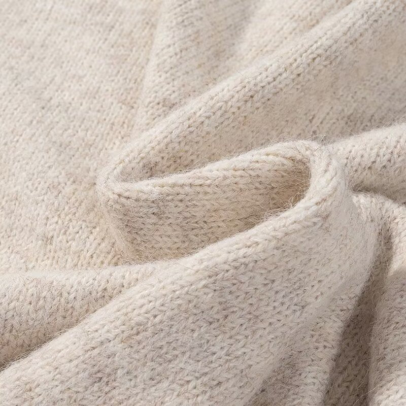 Manteau en tricot doux pour femmes à coupe large et détails élégants Chic & Stil