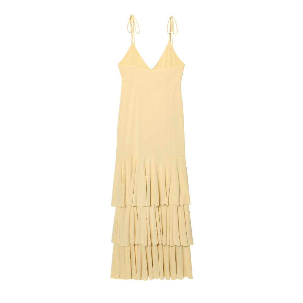 Maxi dress for women with voluminous ruffle details and adjustable spaghetti straps Lune London