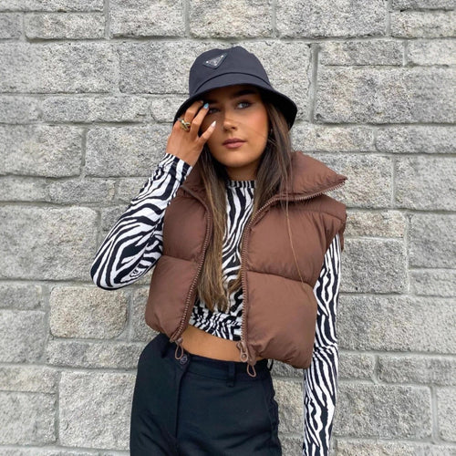 Quilted vest for women with high collar and practical pockets Lune London