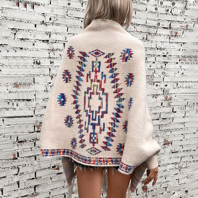 Wool poncho for women with colorful Navajo pattern and fringed hem Lune London