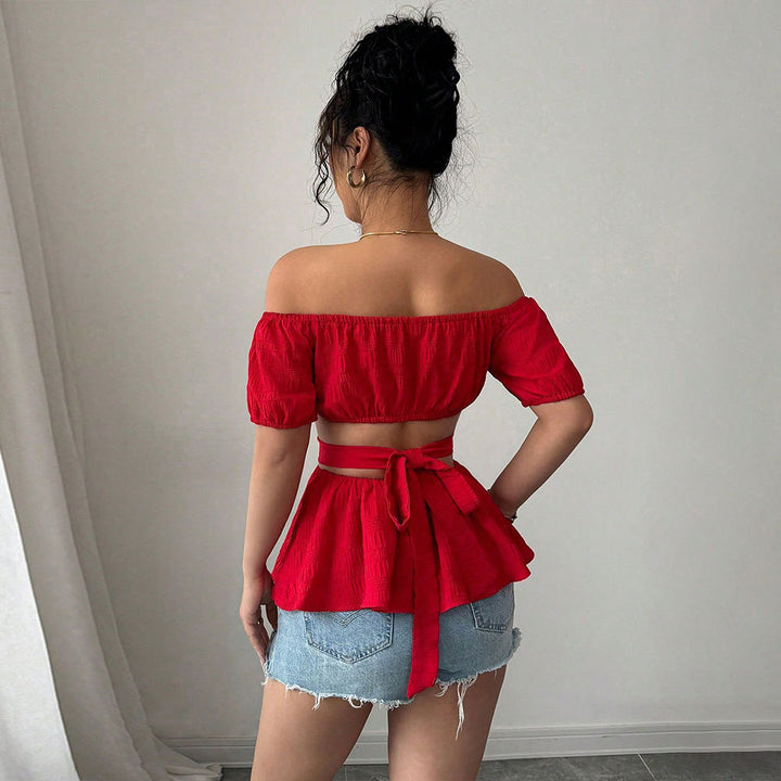 Blouse femme à épaules dénudées avec ourlet froncé et découpes latérales Chic & Stil