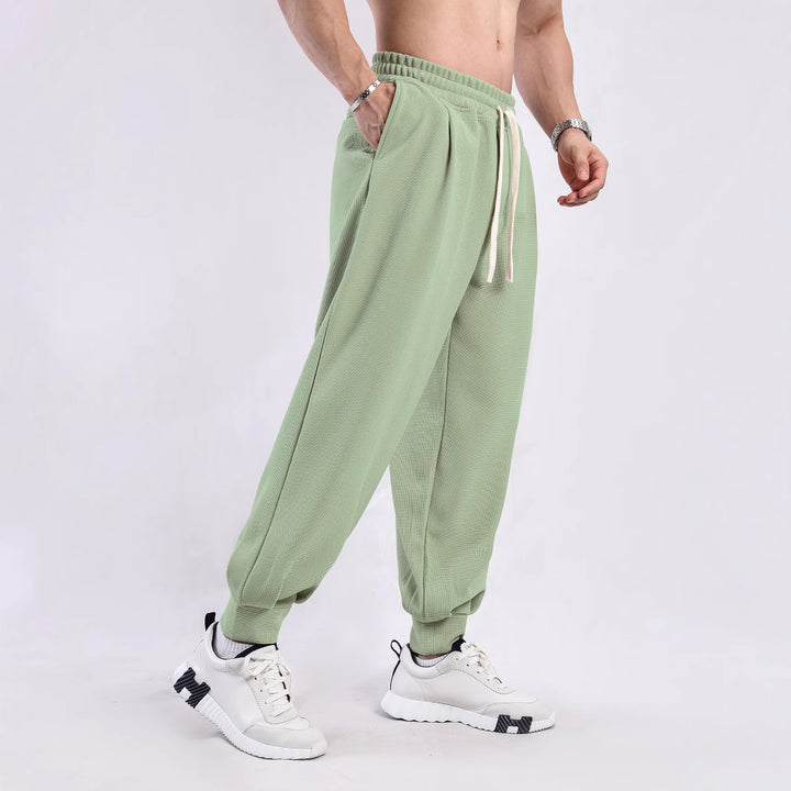 Casual men's jogging pants with elastic waistband and side pockets Lune London